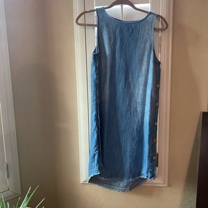 Cute chambray sheath dress with fringe detail.